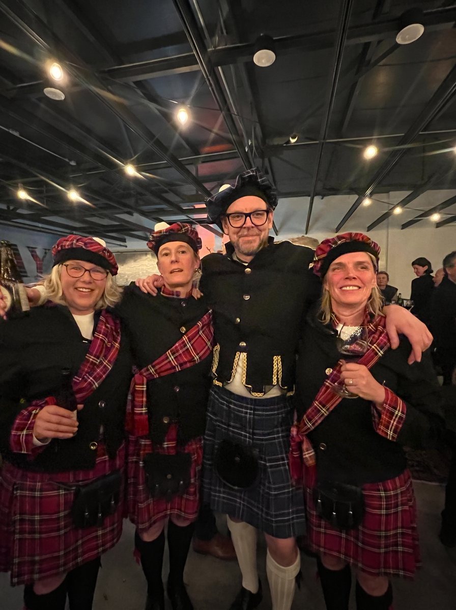 The crew in tartan berets, sashes and kilts at Highland Dance Night